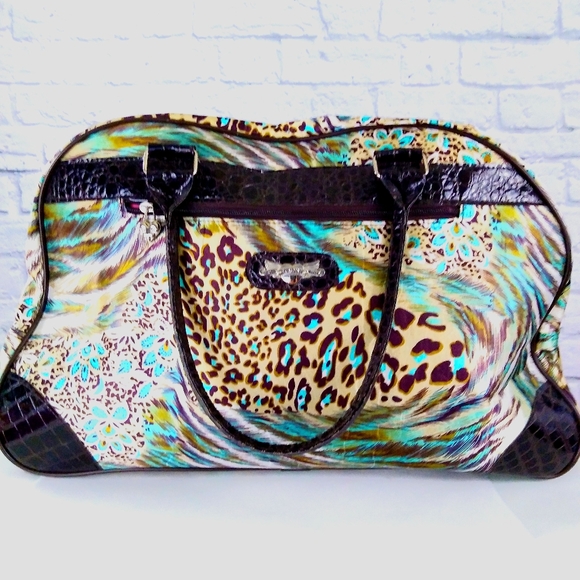 Kathy Van Zeeland Handbags - Kathy Van Zeeland Animal Print Wheeled Travel Bag